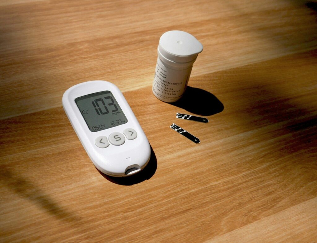 diabetes-medication-weight-loss. a thermometer, pills, and a bottle on a table